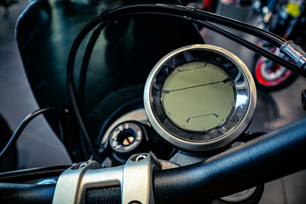 a close up of a speedometer on a motorcycle