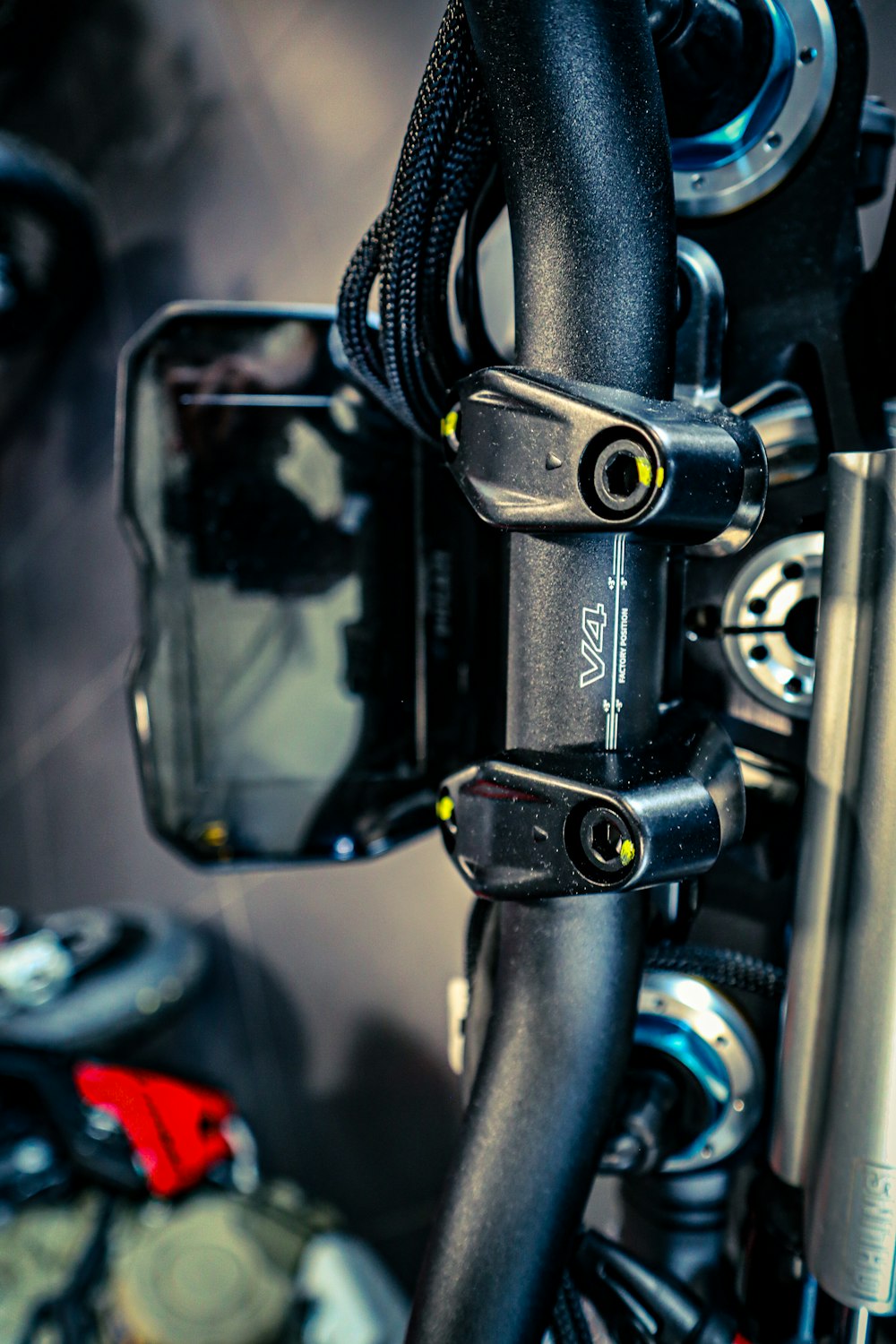 a close up of a bike handlebar with a camera attached to it