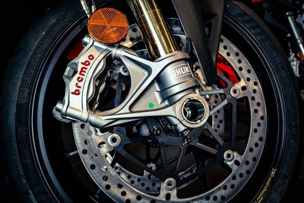 a close up of a motorcycle's front brake