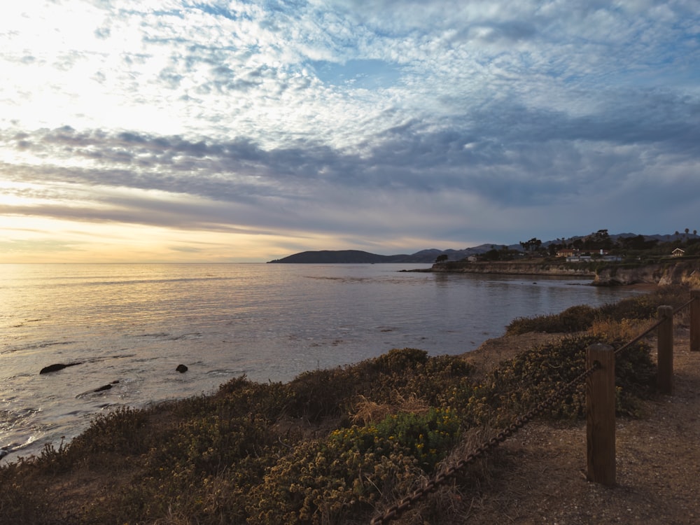 a view of a body of water from a hill