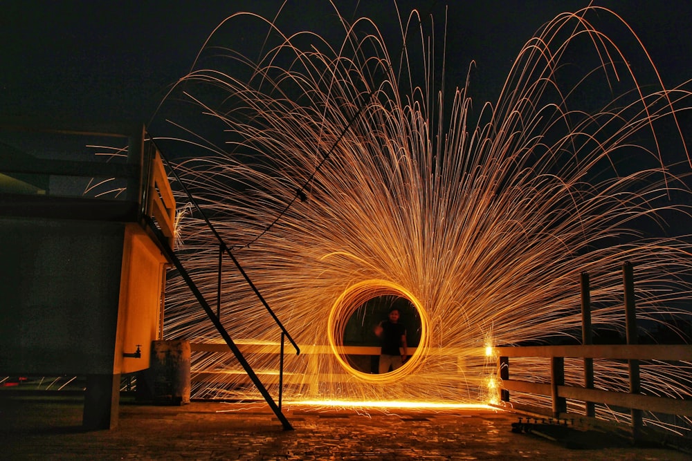 a man standing in front of a large metal object