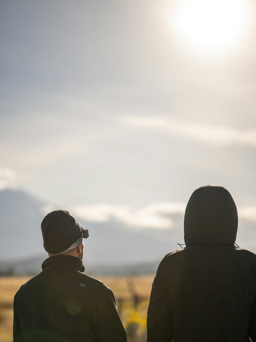 a couple of men standing next to each other