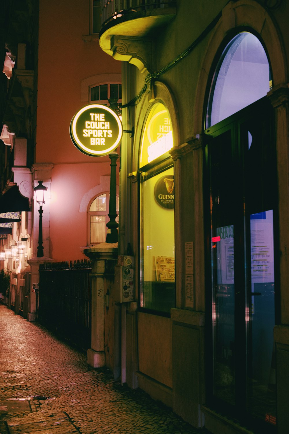 a building that has a neon sign on it