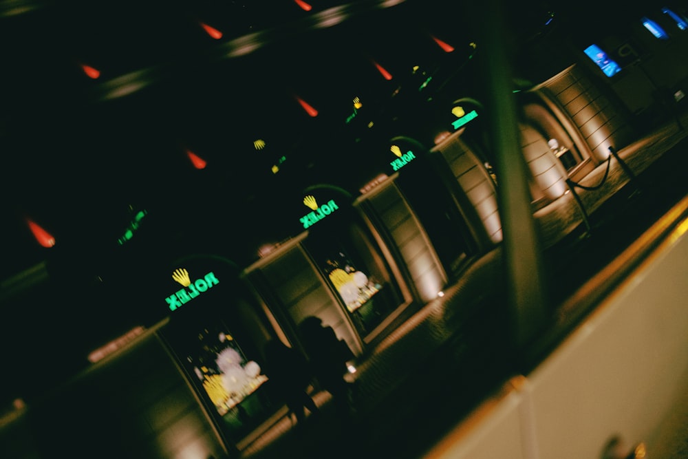 a train station at night with lights on