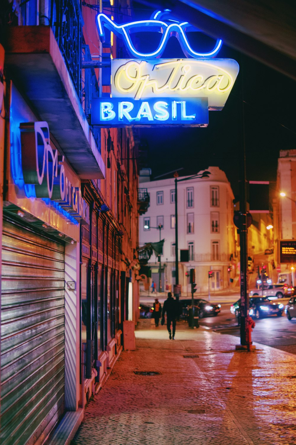 a neon sign on the side of a building