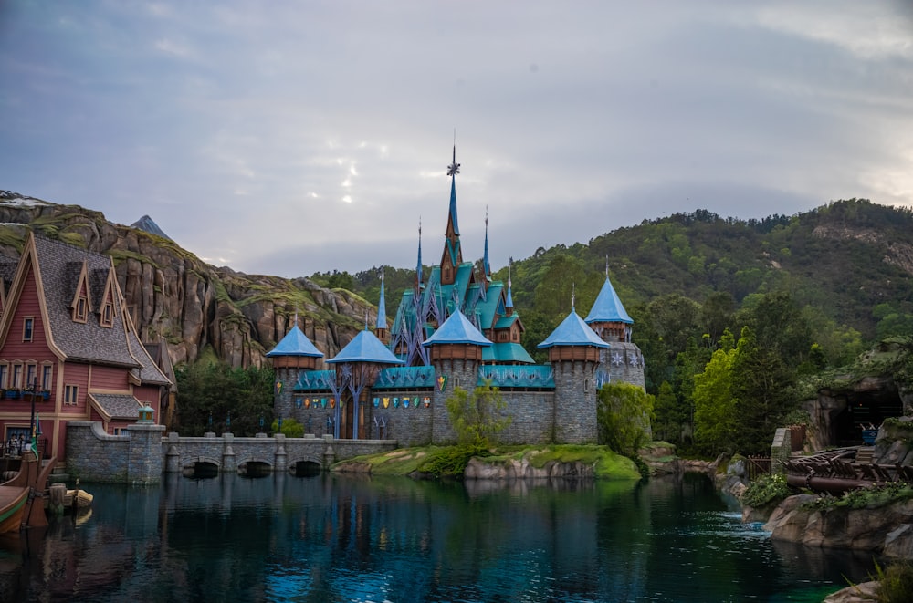 a castle with a lake in front of it