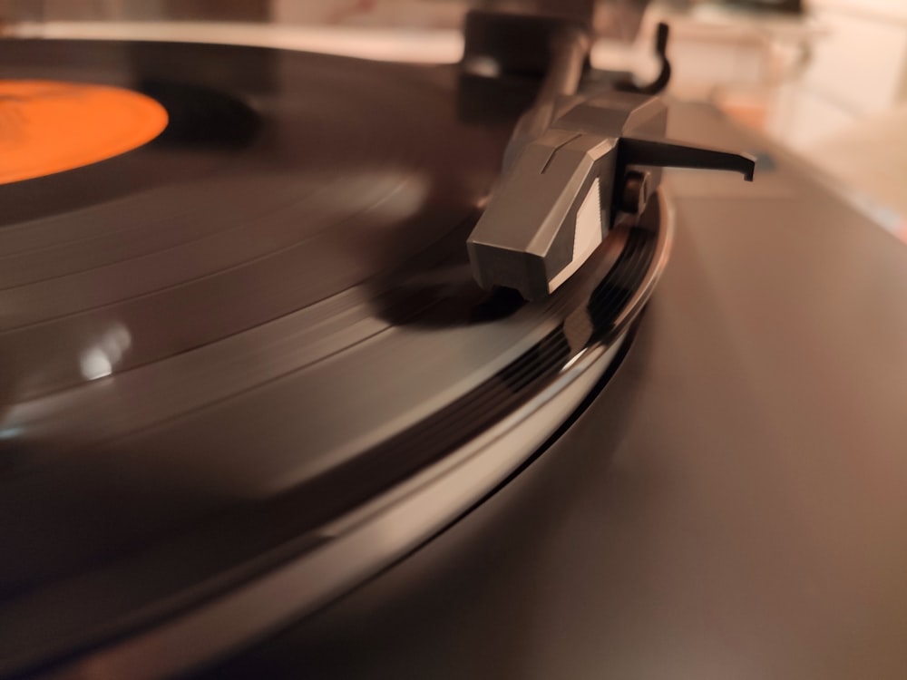 a record player spinning a record on a turntable