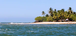a small island in the middle of a body of water