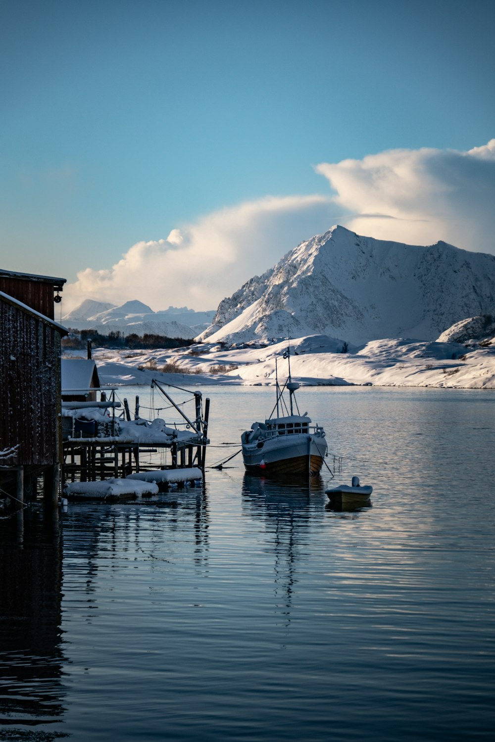 a couple of boats that are sitting in the water