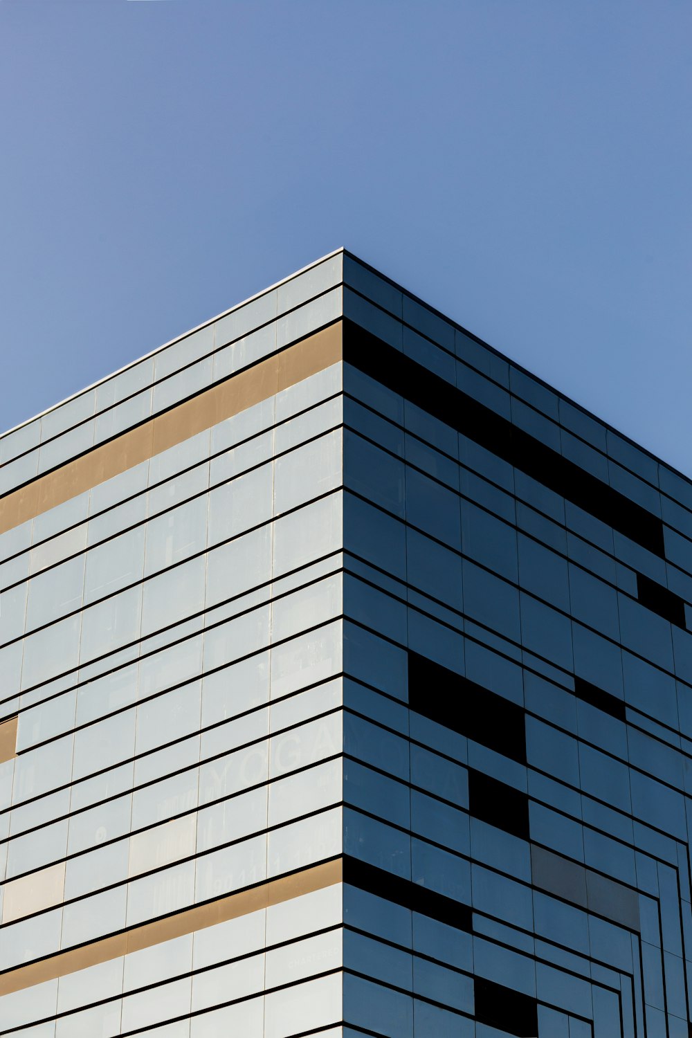 a tall building with a clock on the side of it