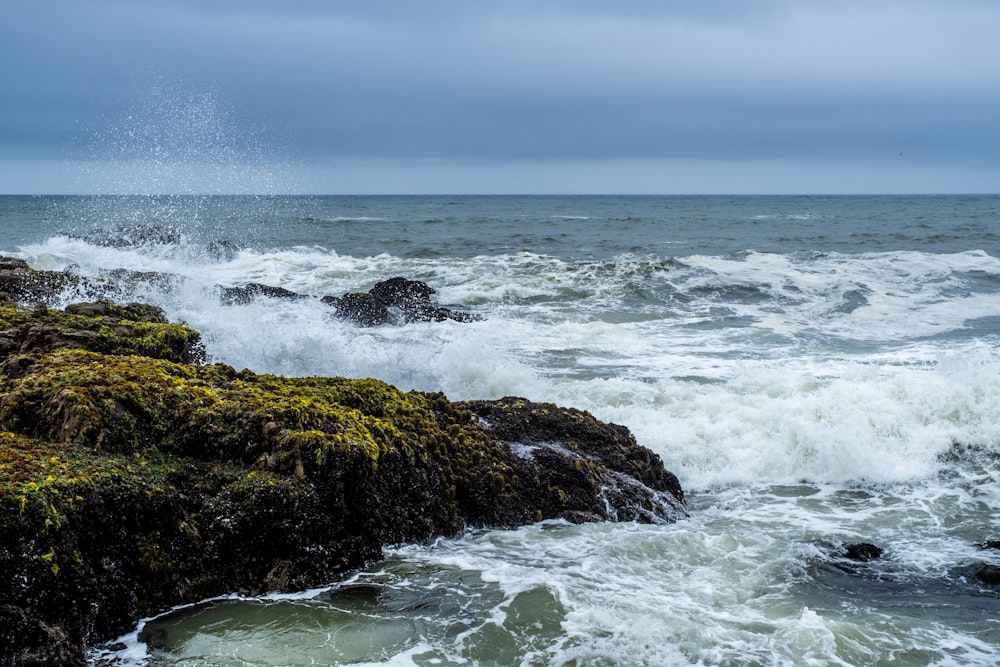 a large body of water surrounded by rocks