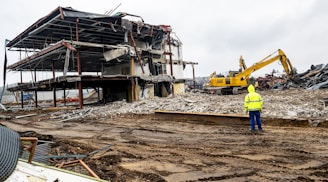 a man standing in front of a construction site