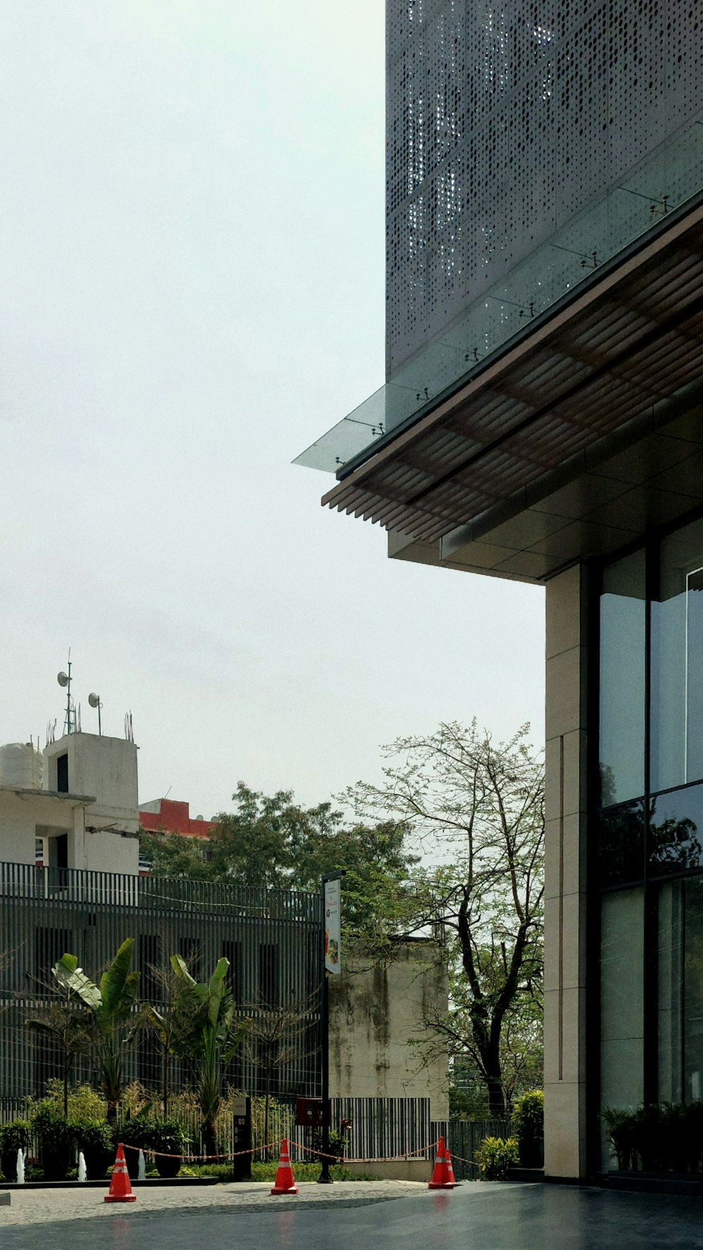 a stop sign in front of a tall building