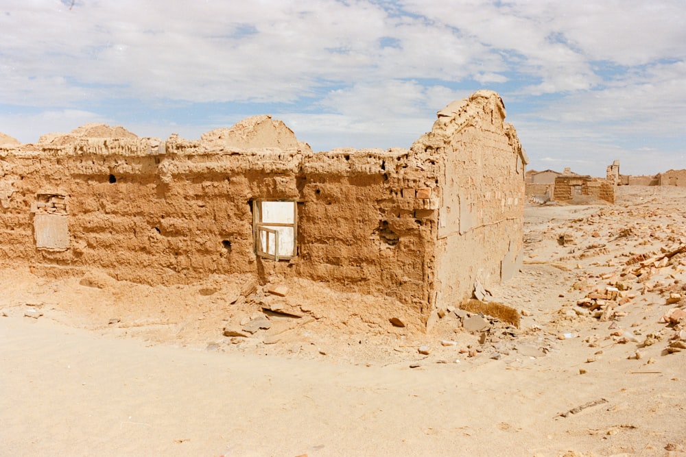 a building in the middle of a desert