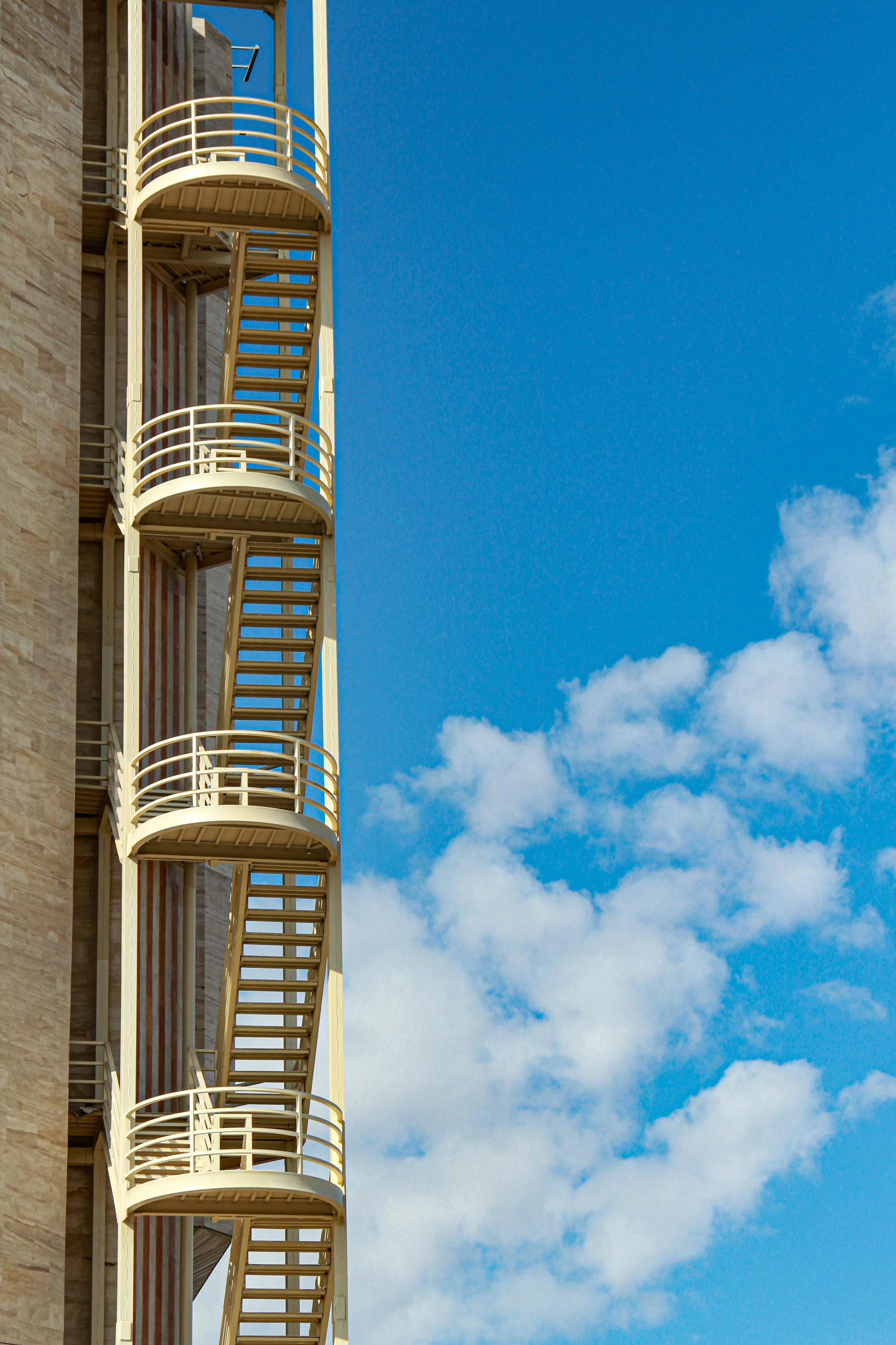 a tall building with a clock on the side of it