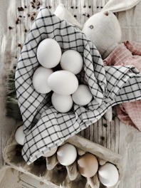a bunch of eggs sitting on top of a table