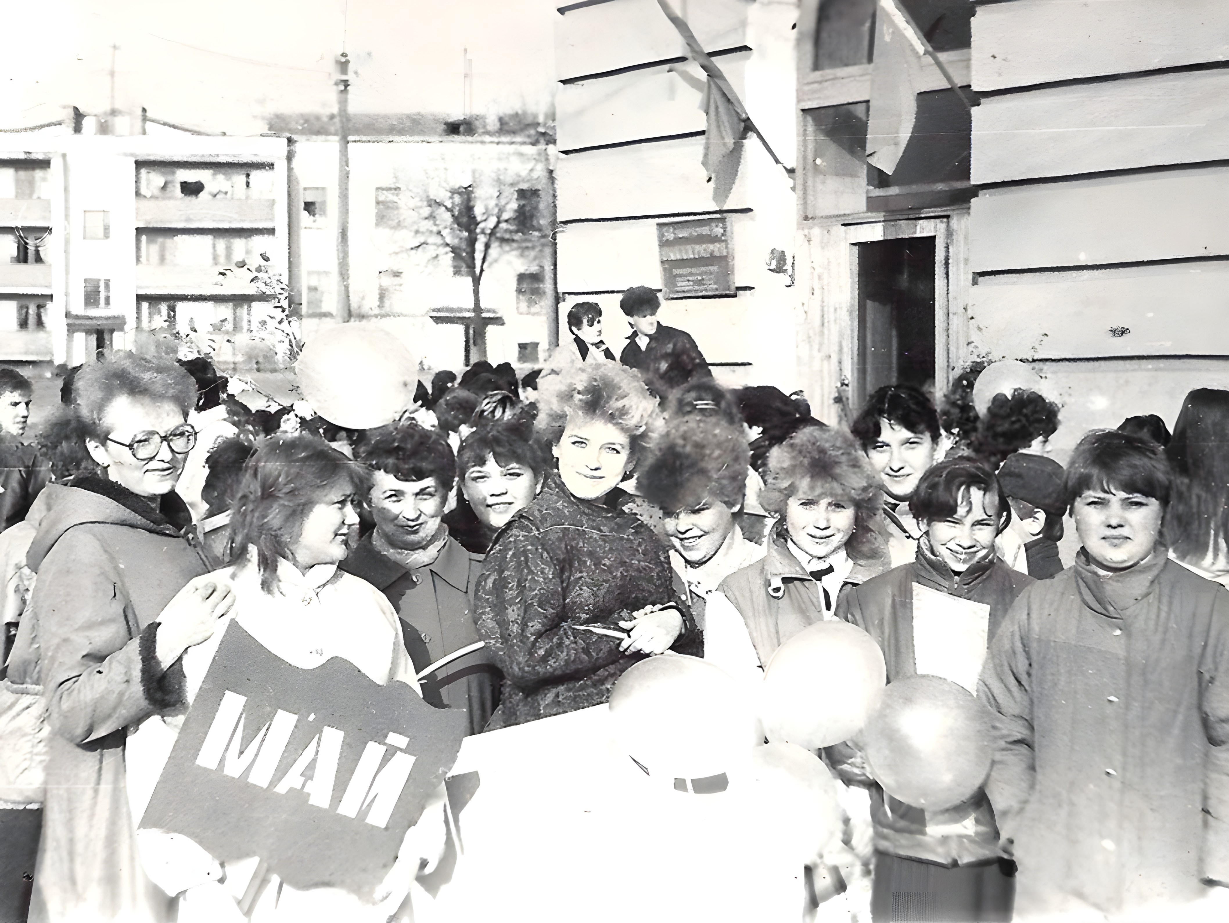 a black and white photo of a group of people