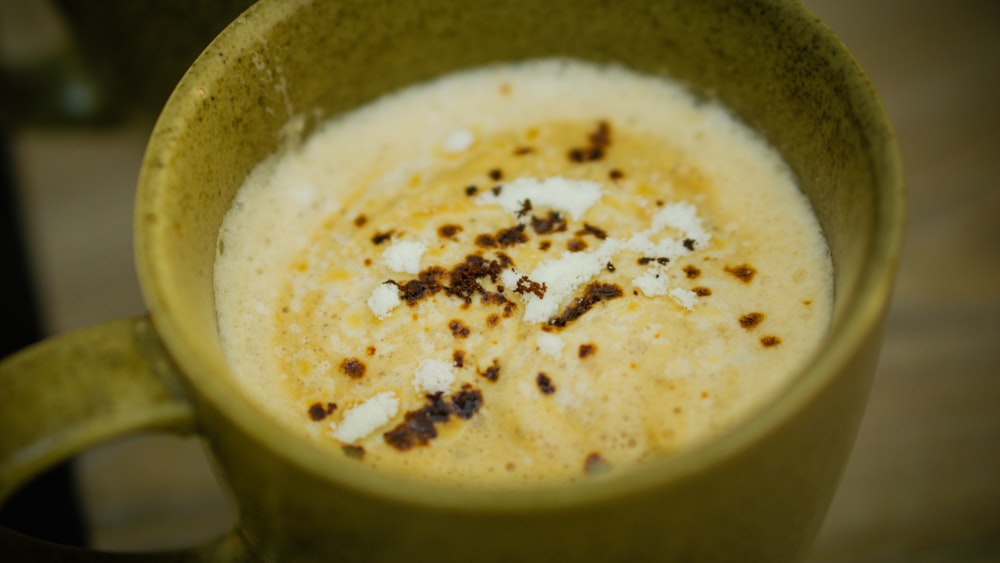 a close up of a cup of food on a table