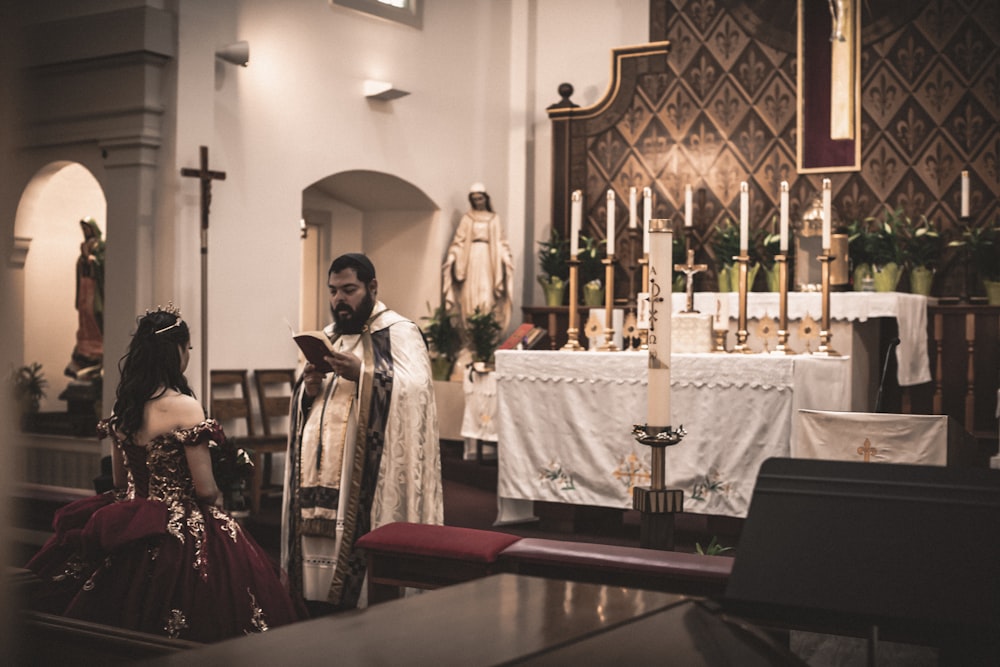 a man and a woman standing in a church