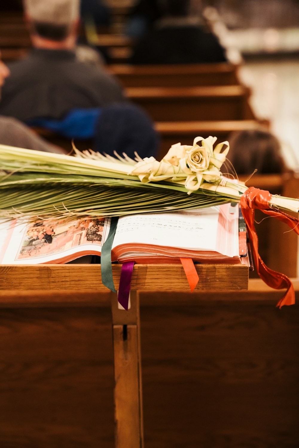 a bunch of flowers sitting on top of a wooden table