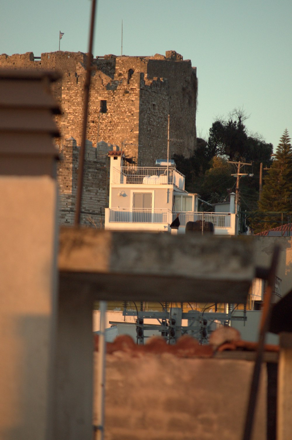 a boat is docked in front of a castle