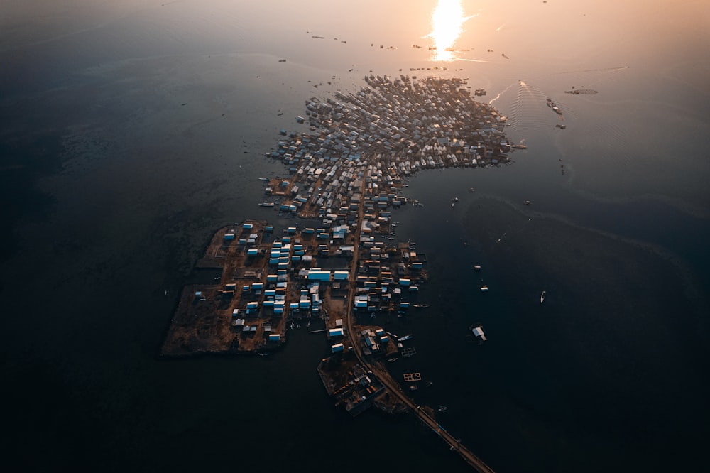 an aerial view of a city in the middle of the ocean