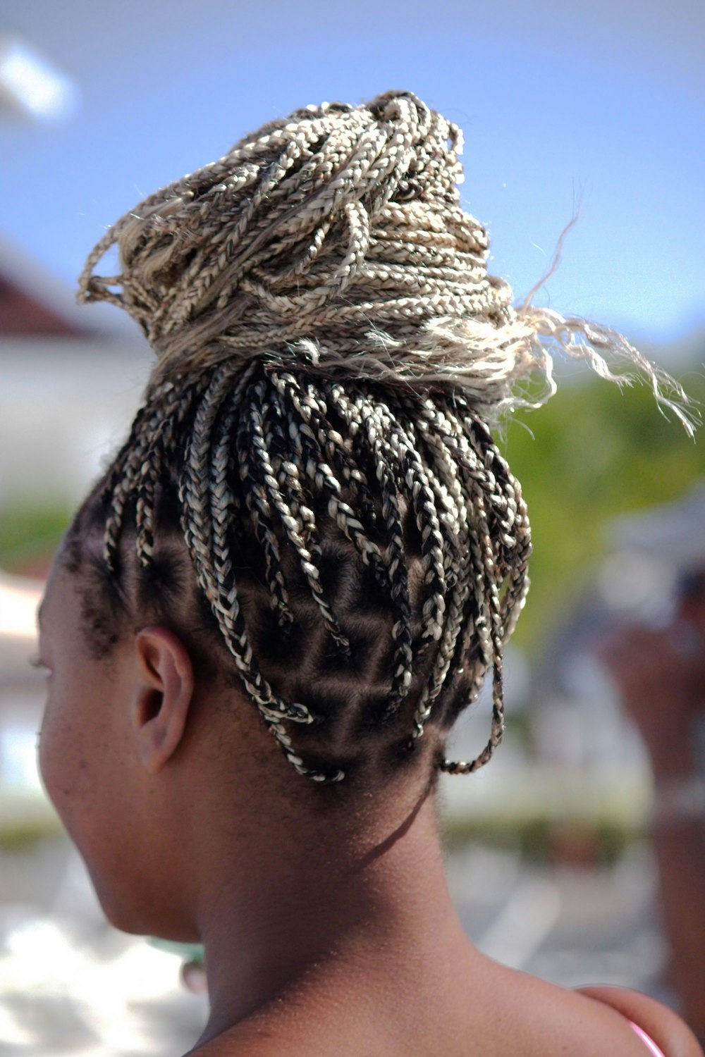 a woman with braids in her hair
