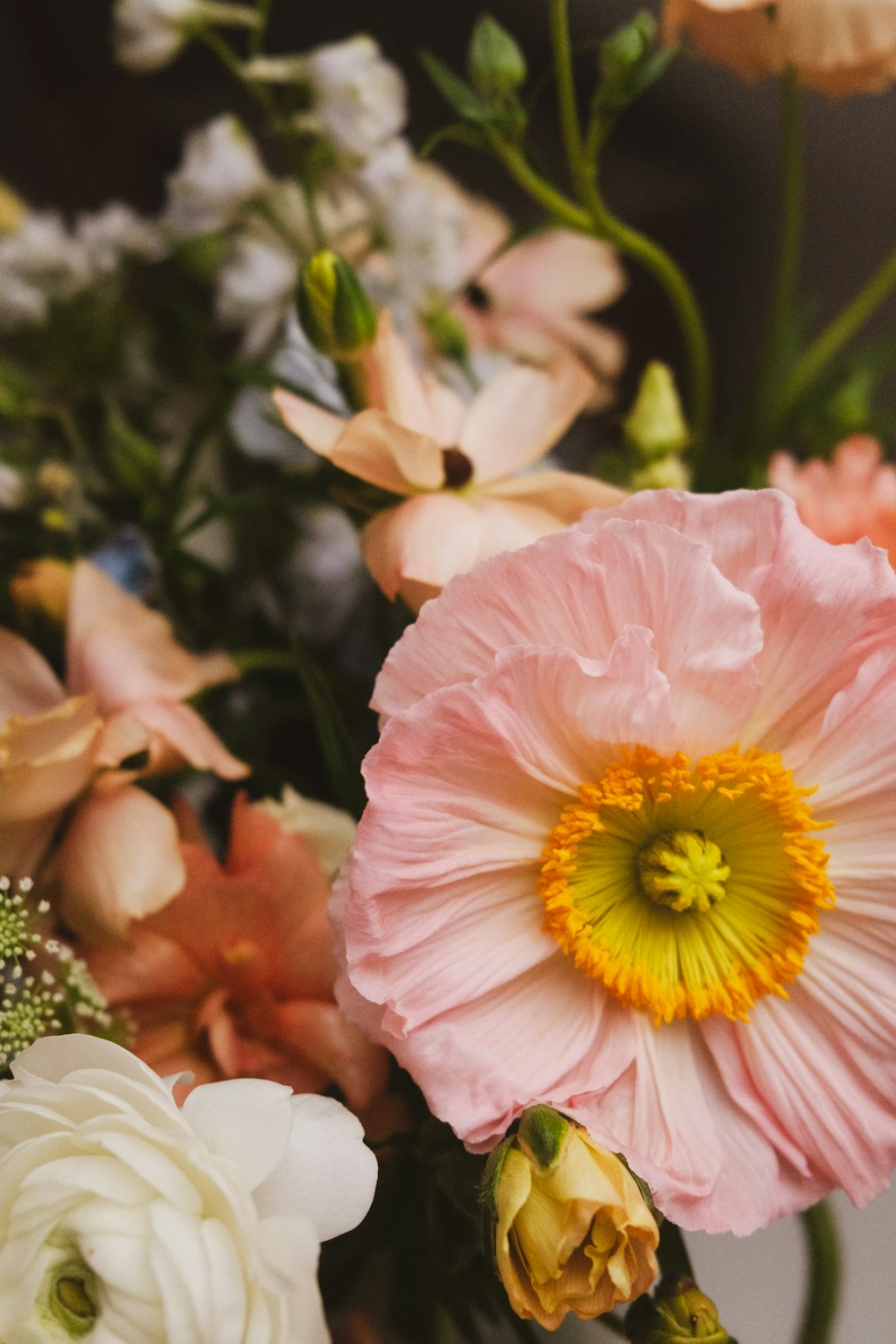 a bunch of flowers that are in a vase