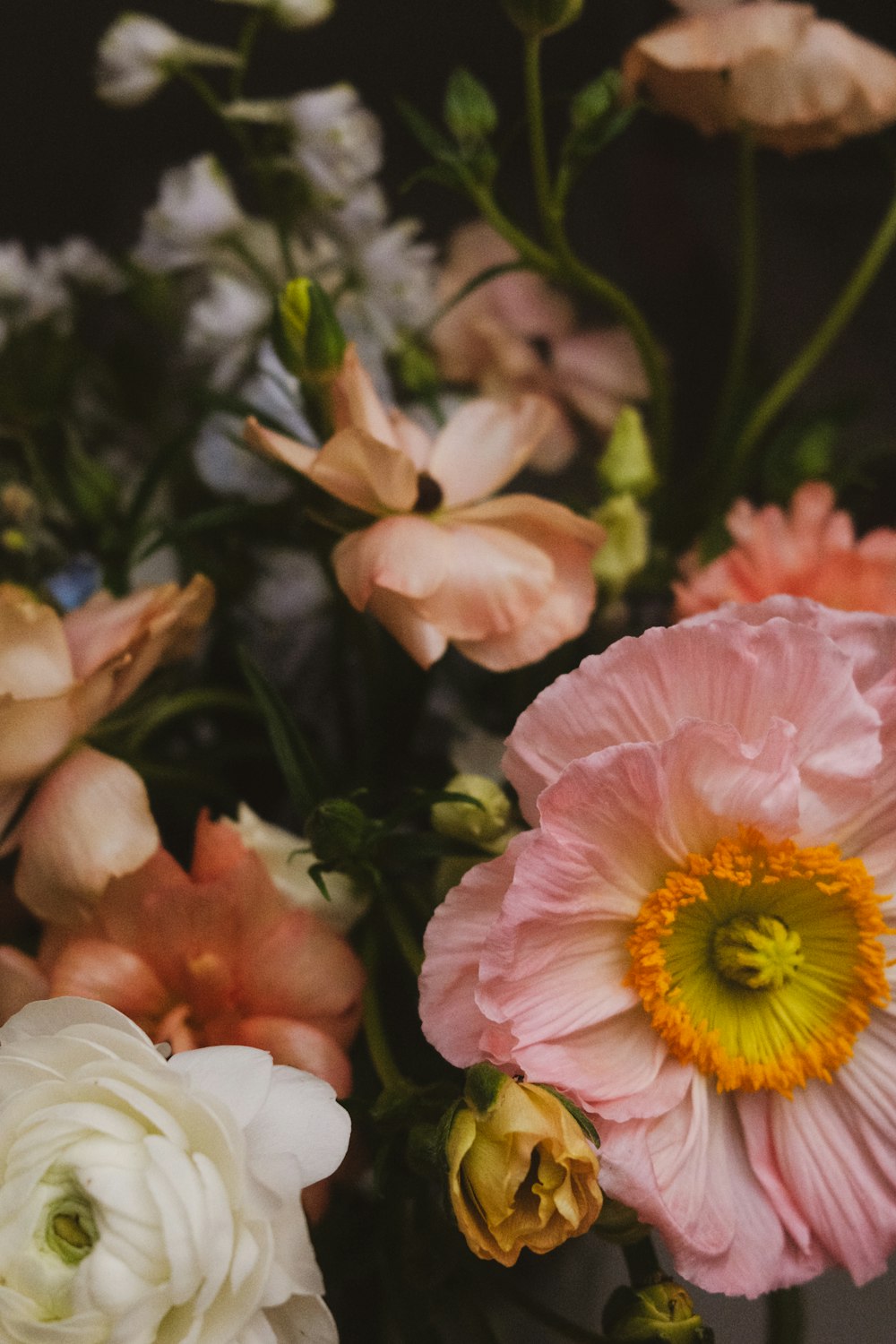 a bunch of flowers that are in a vase