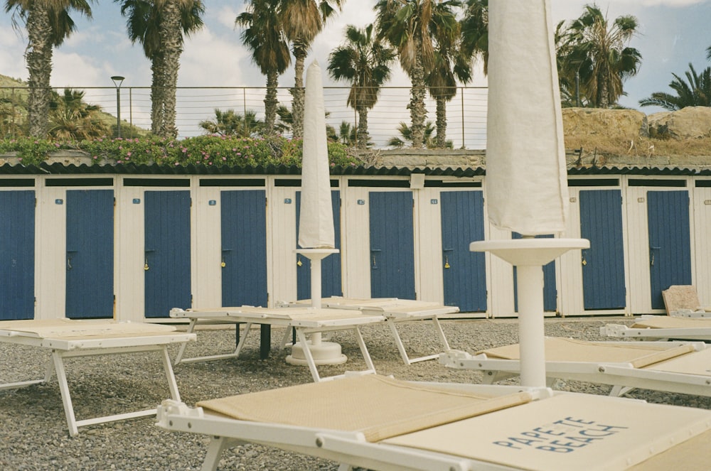 a row of beach chairs sitting next to each other