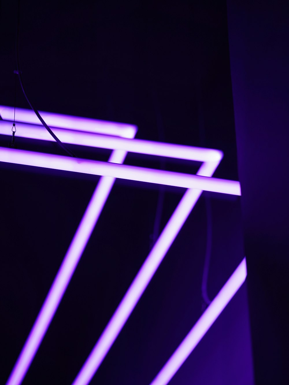 a close up of a purple light in a room