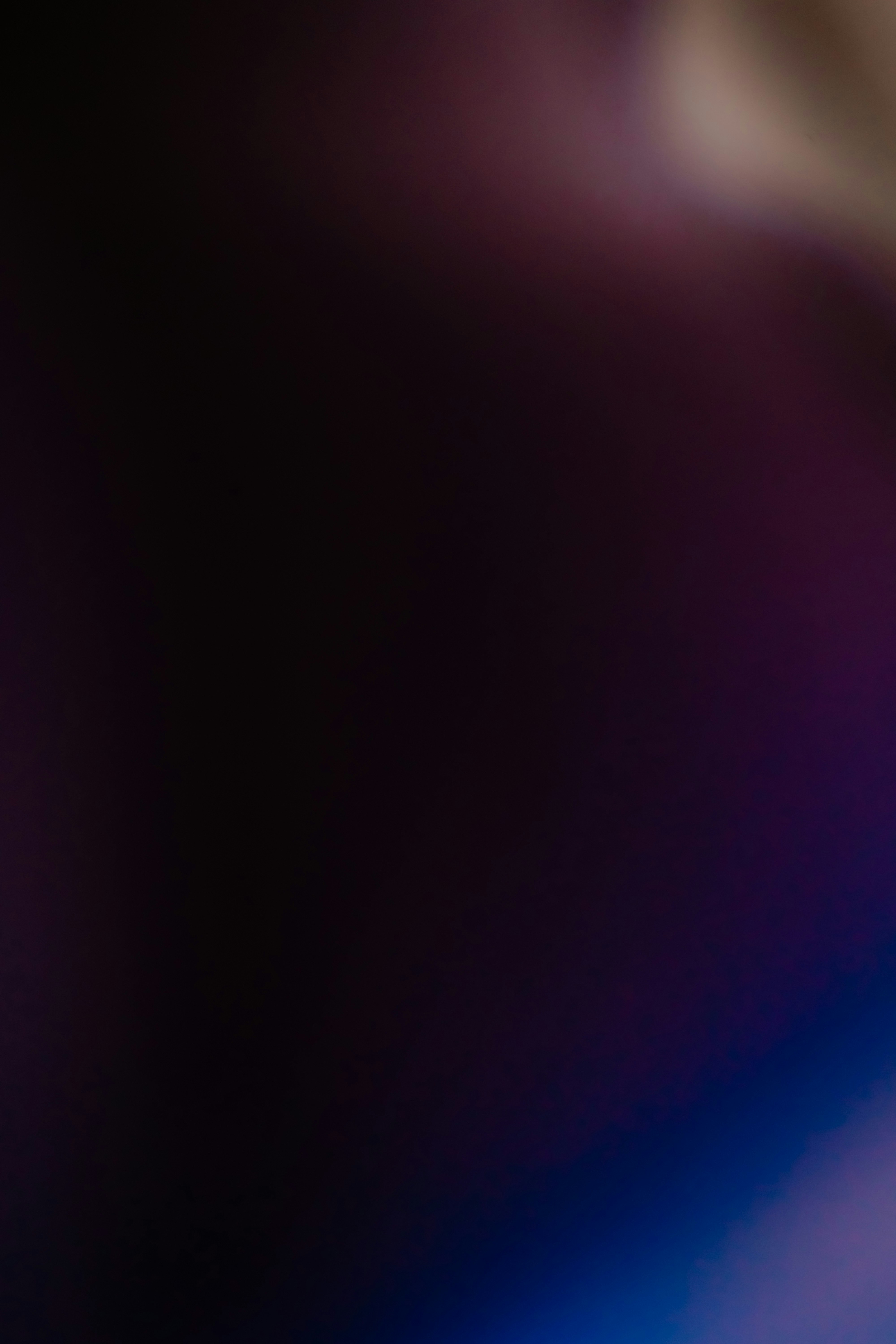 a close up of a cell phone with a blurry background