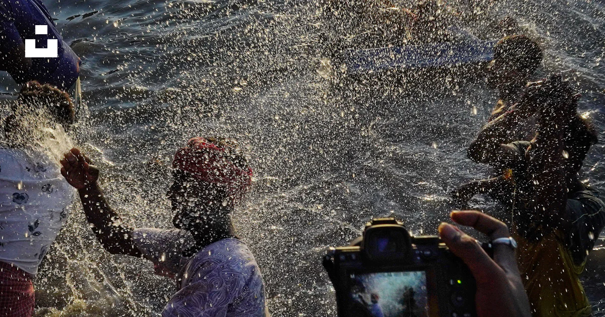 Splashed People A group of people splashing in the water photo – Free Outdoors Image on ...