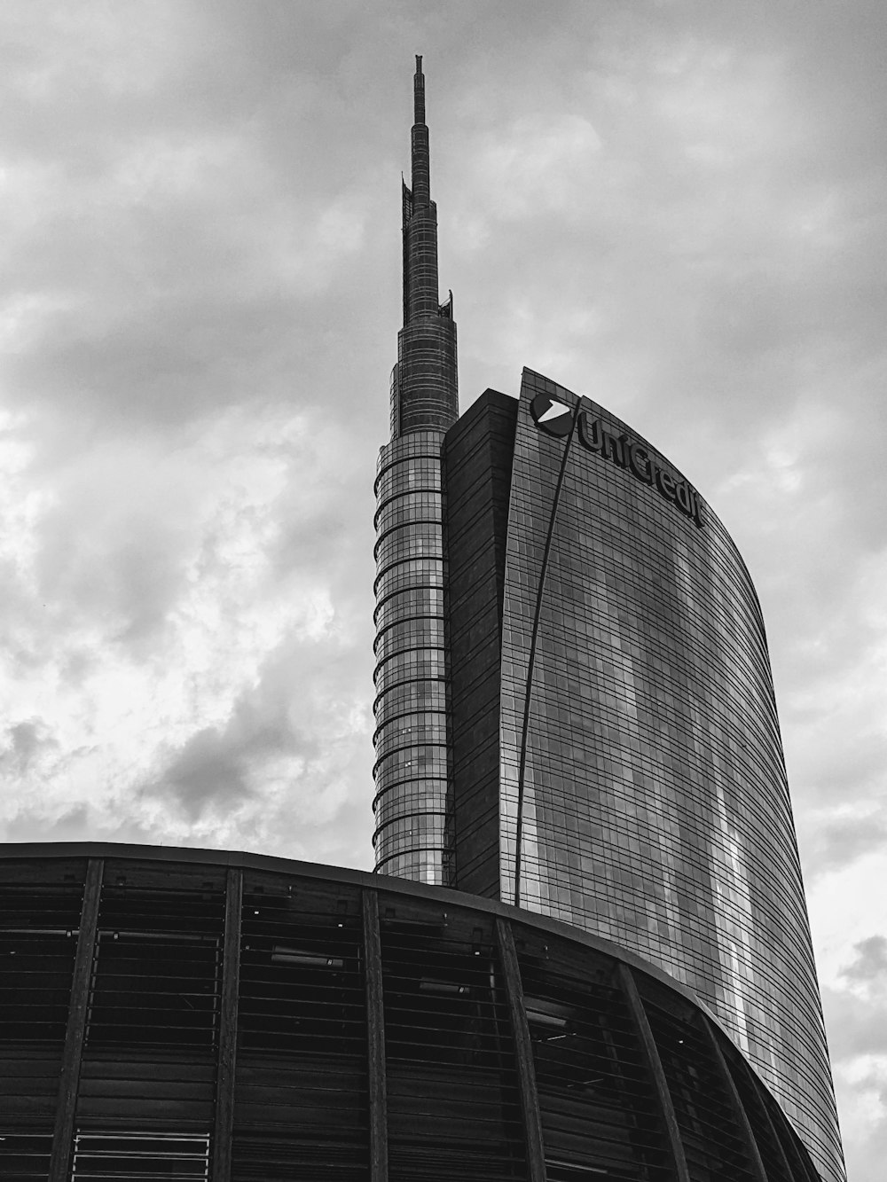 a black and white photo of a tall building