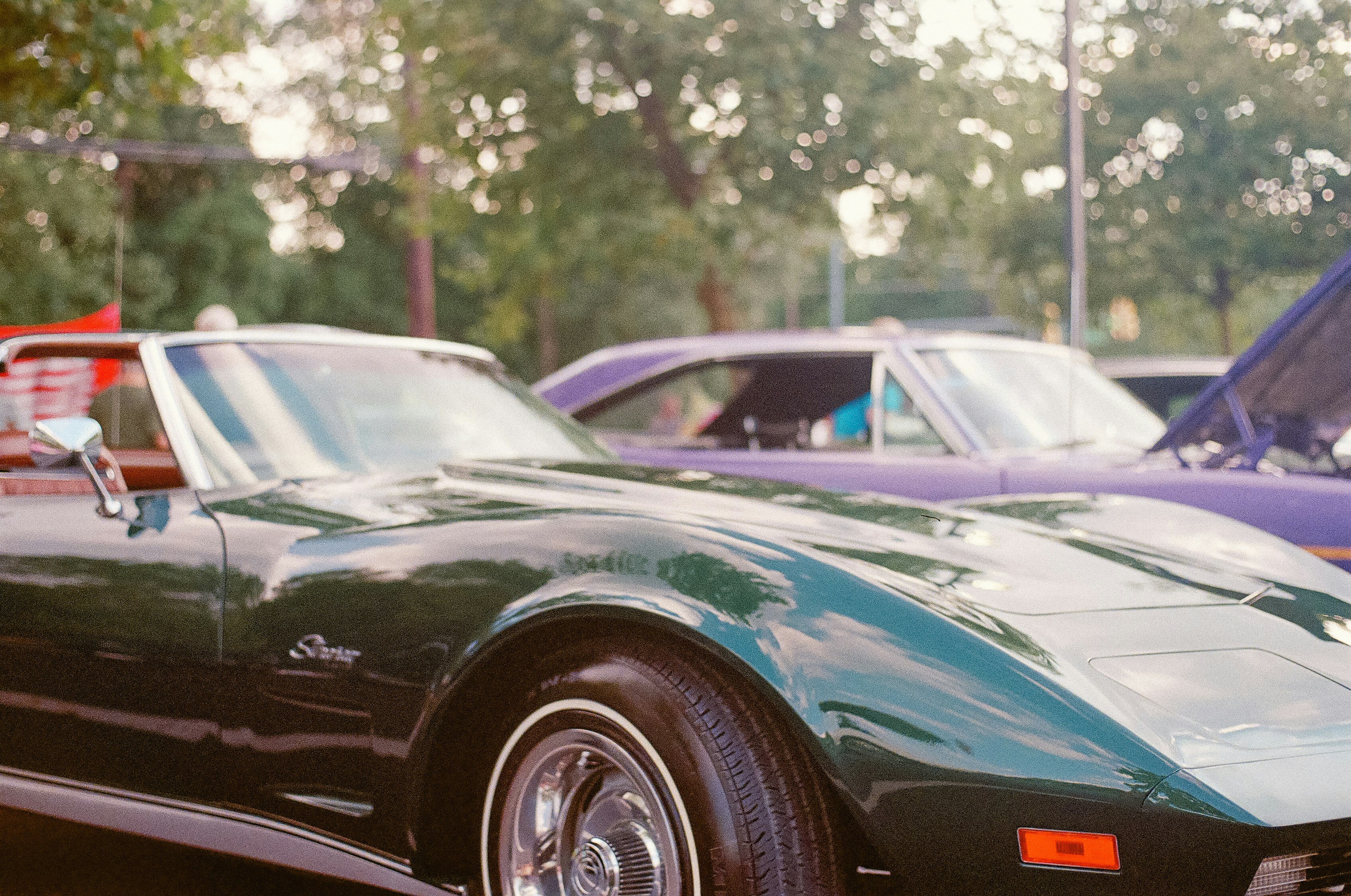 a group of cars parked next to each other