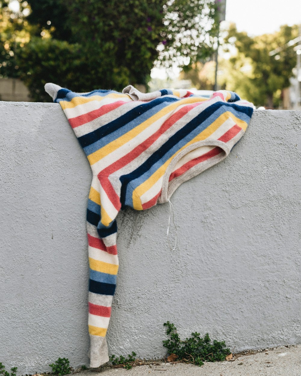 a towel hanging on the side of a wall