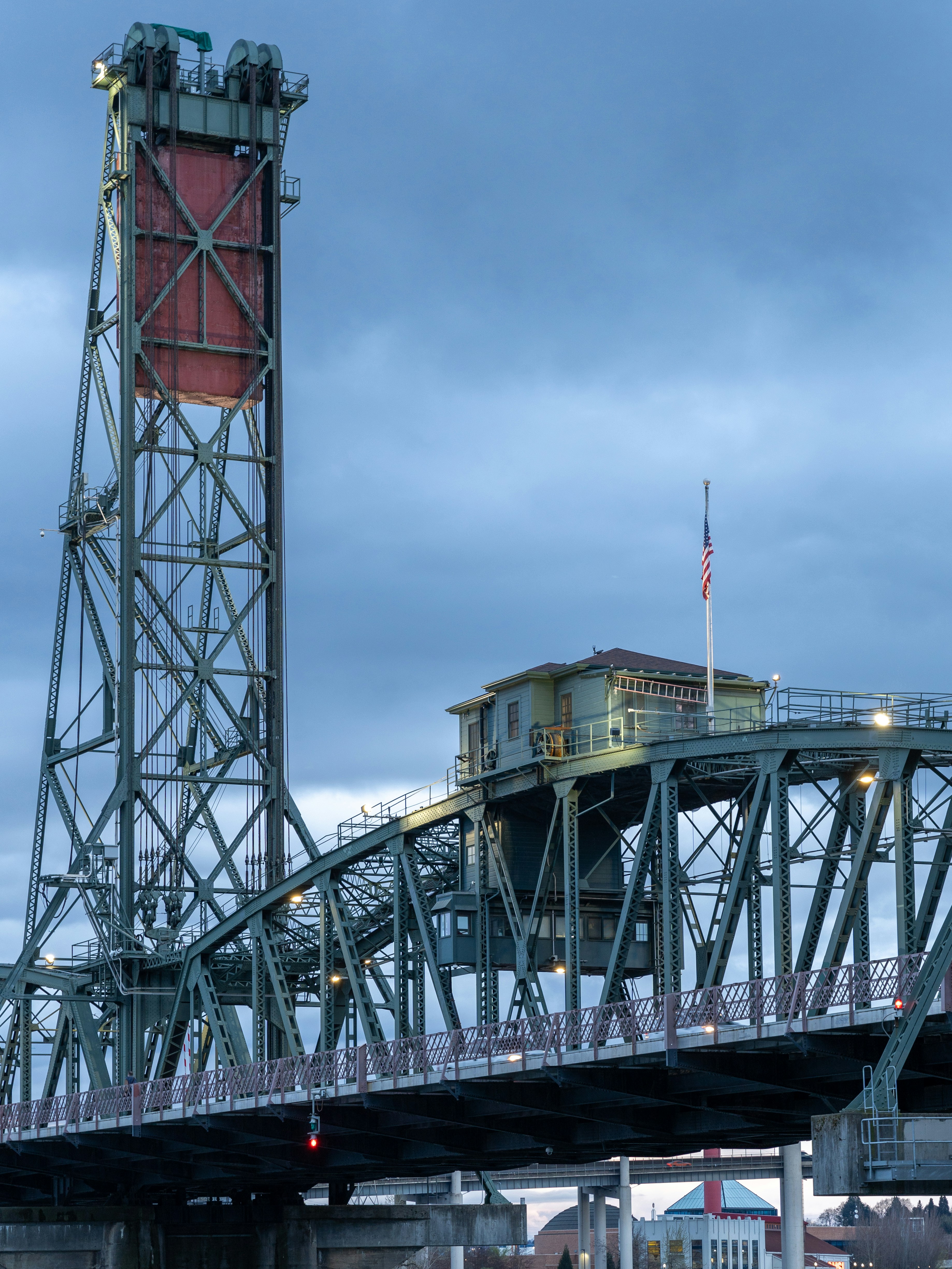 a large bridge with a tower on top of it
