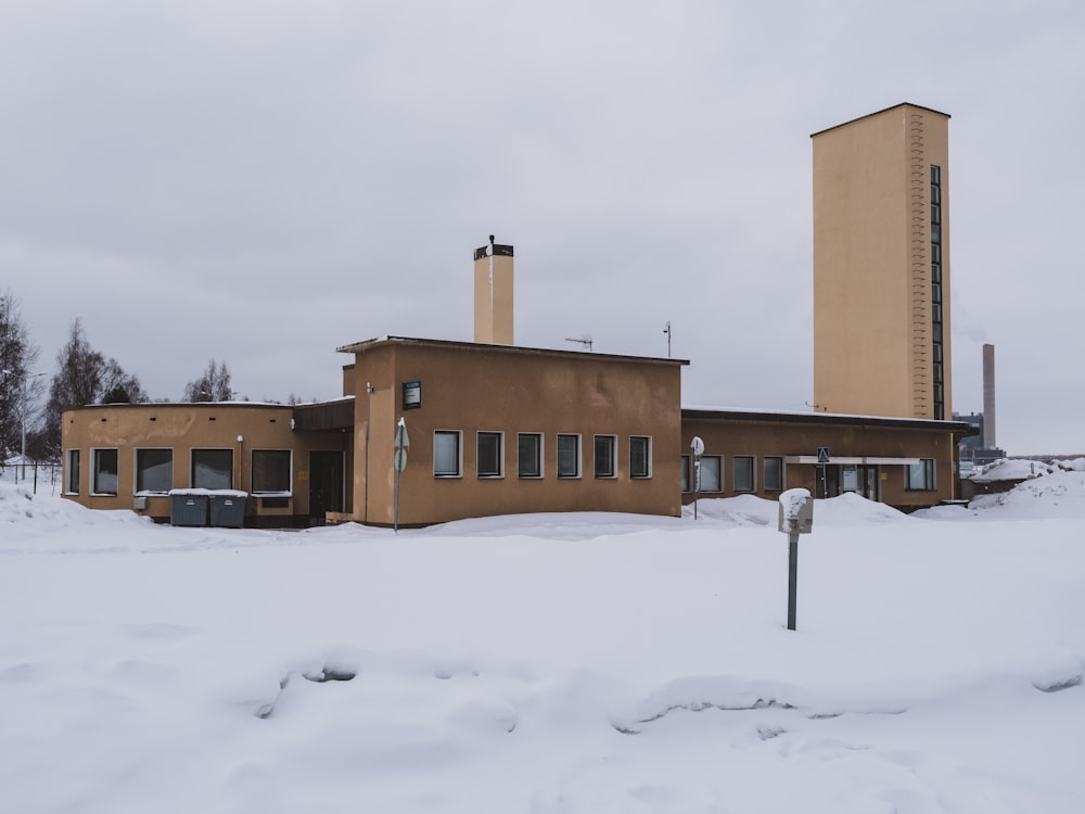 a building with a lot of snow in front of it