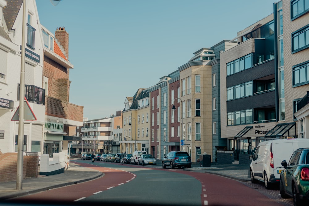 a street with cars parked on both sides of it