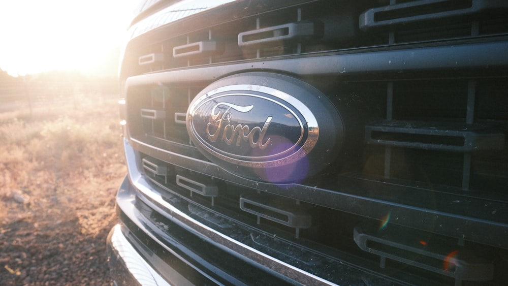 a close up of the grille of a ford truck