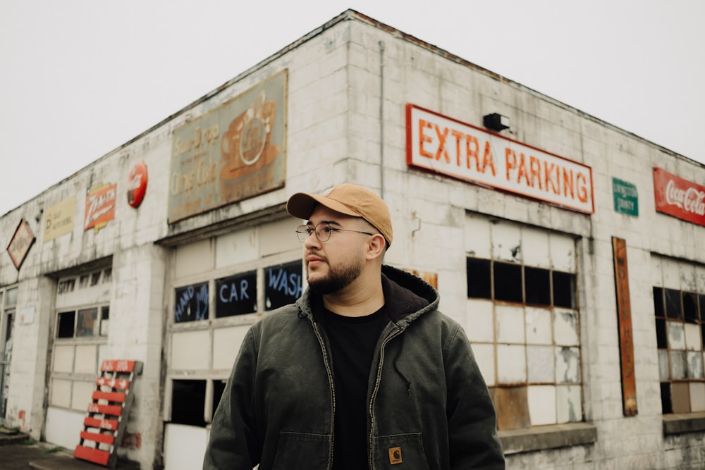 a man standing in front of a building