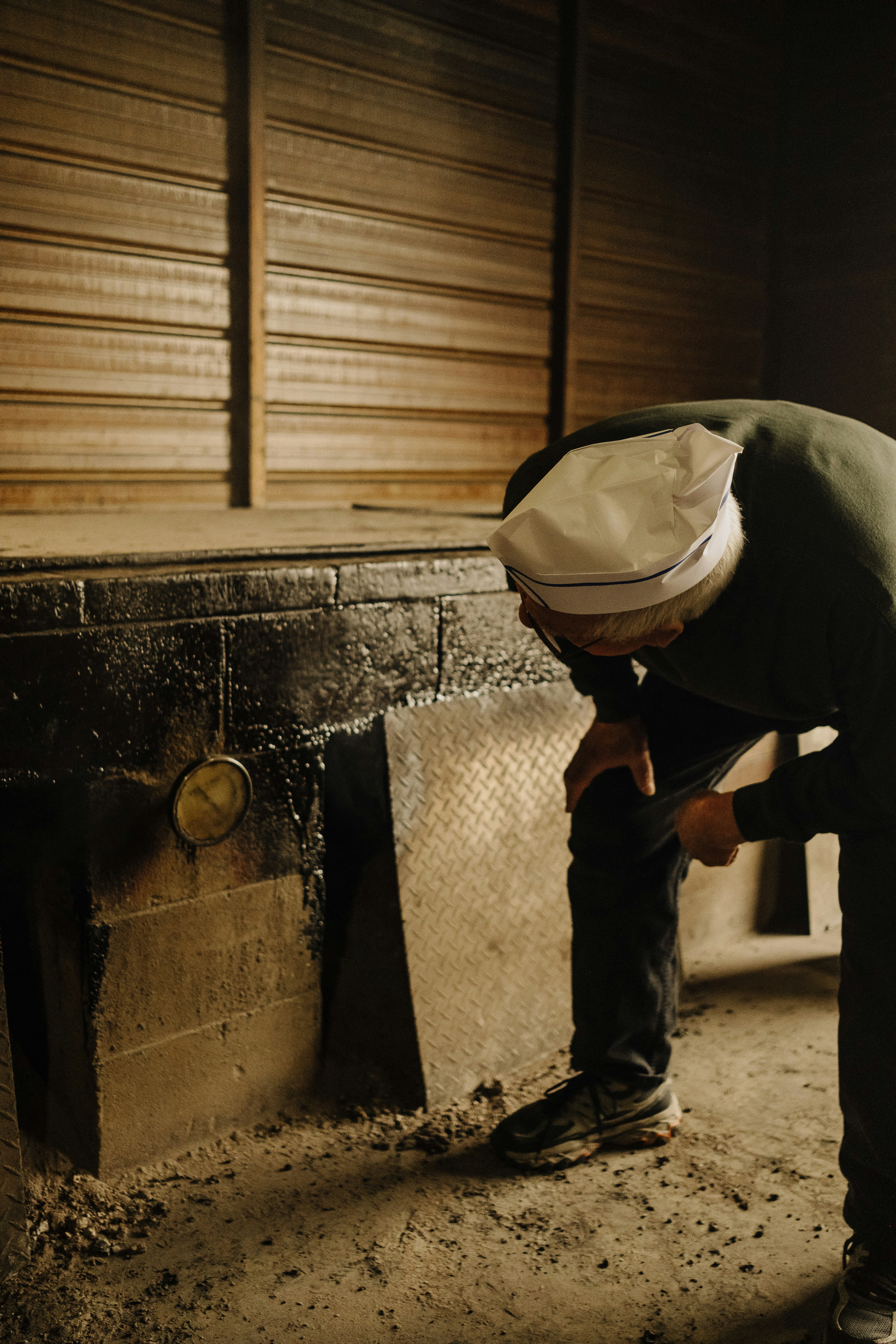 technician inspecting furnace