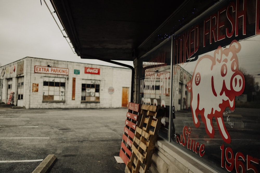 a building with a sign that says meat fresh on it