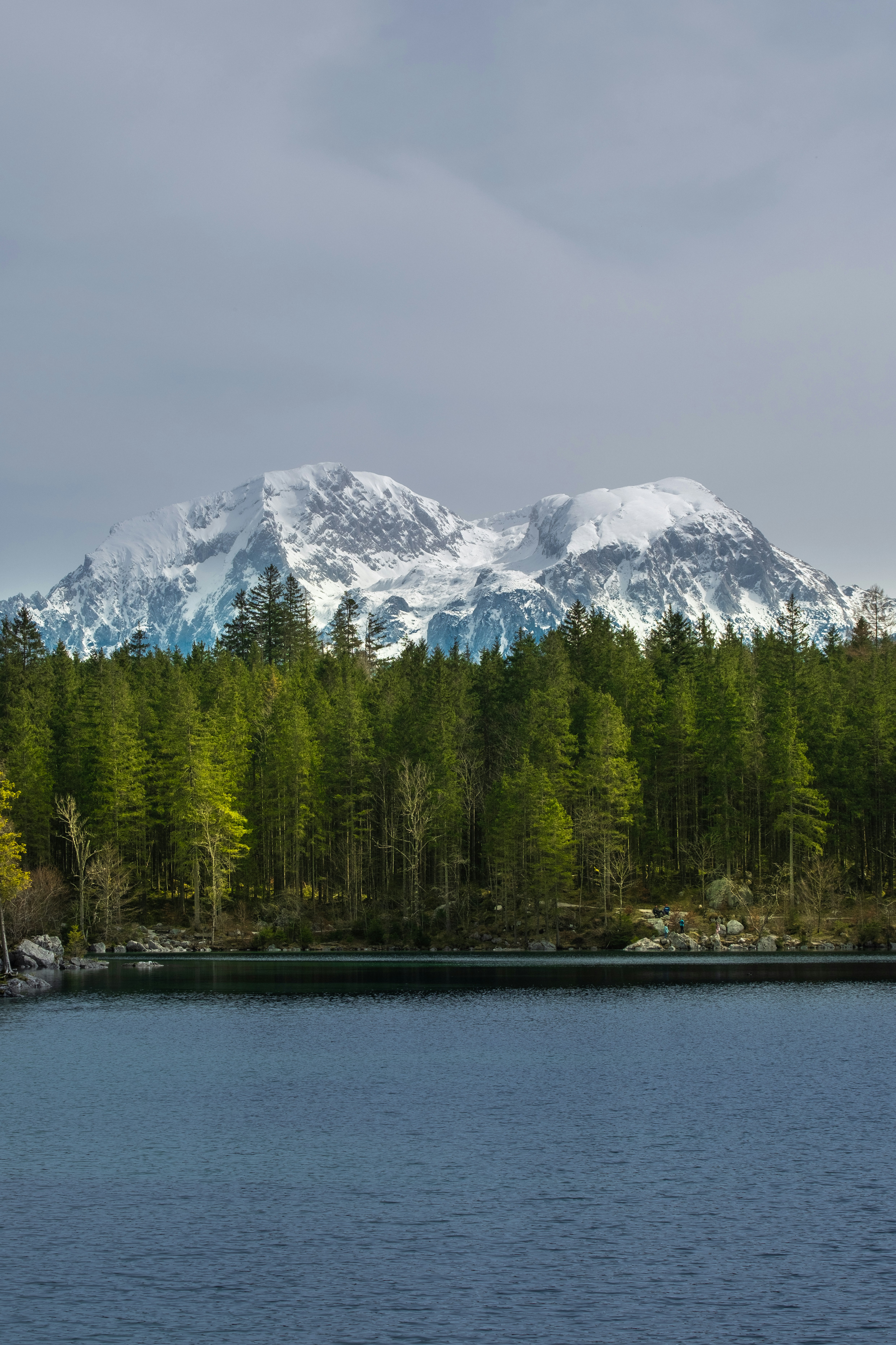 A lake with a mountain in the background photo – Free Forest Image on ...