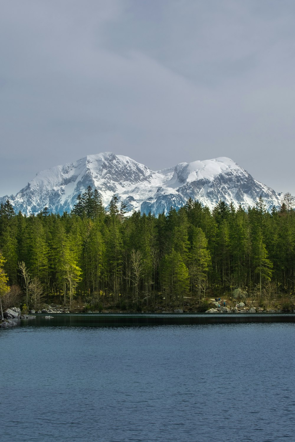 a lake with a mountain in the background