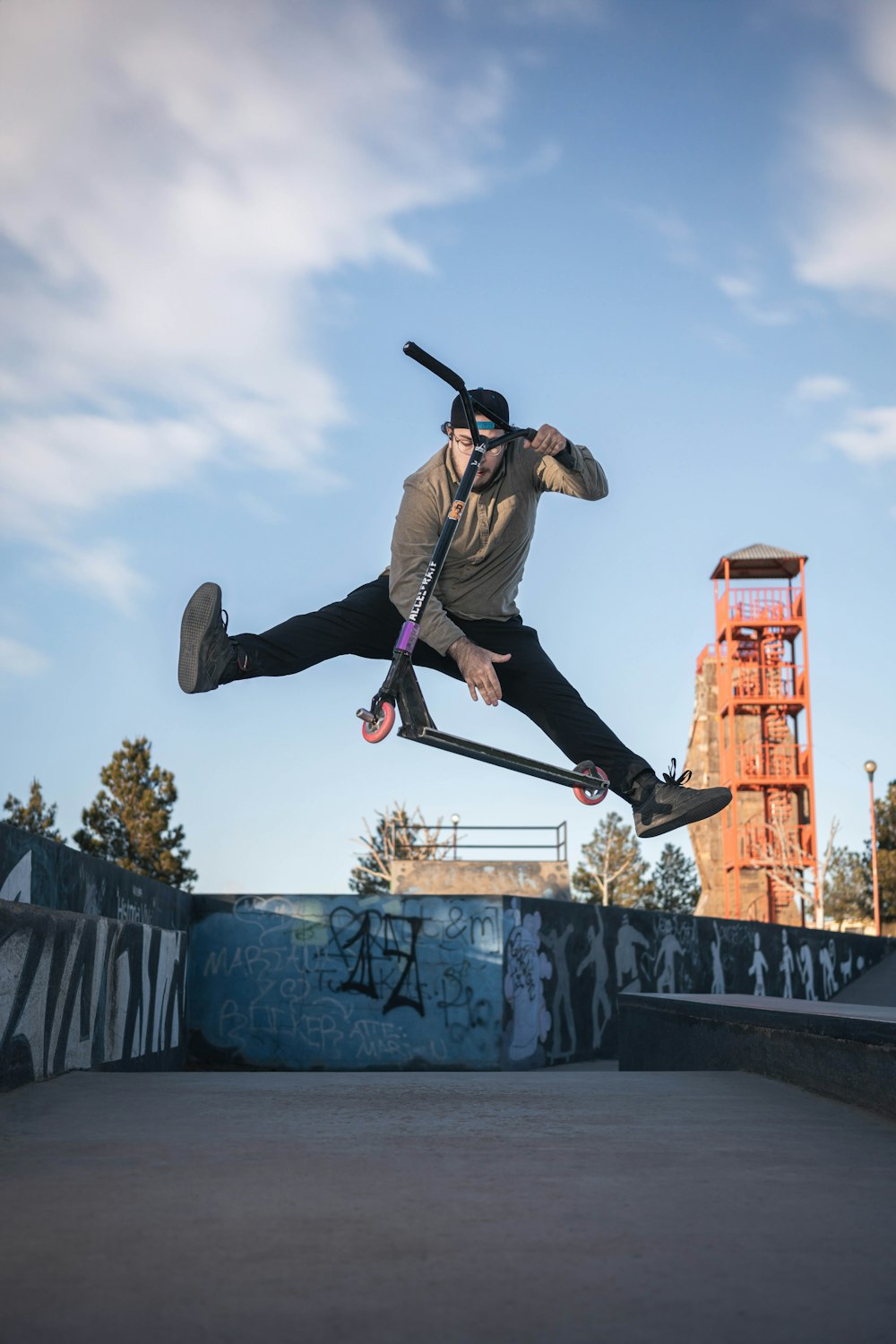 a man flying through the air while riding a skateboard