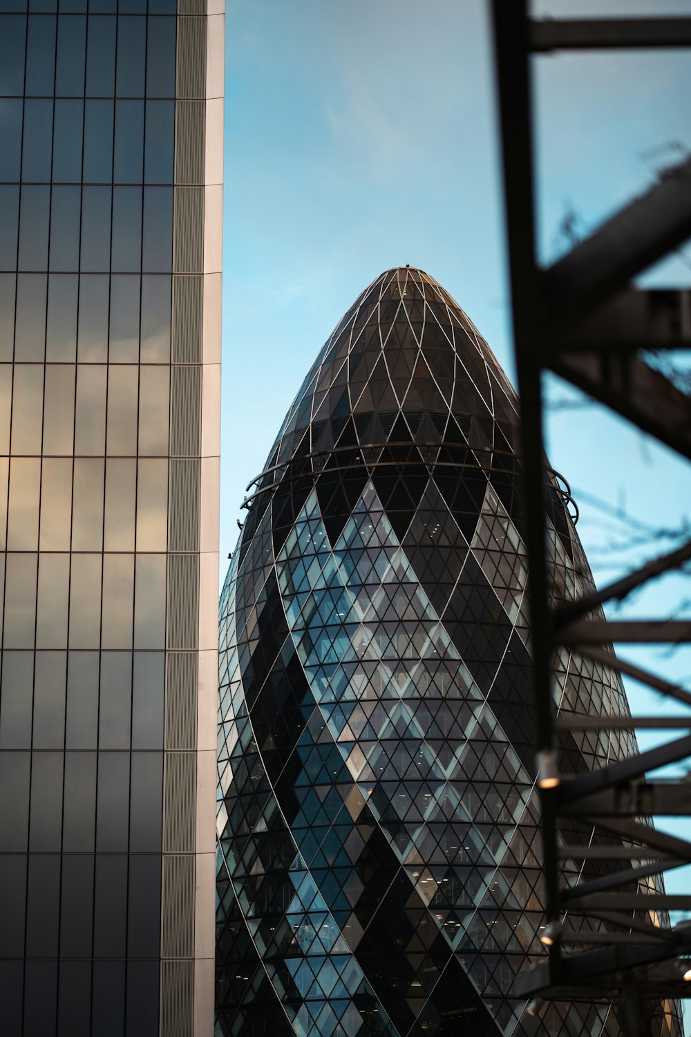 a very tall building next to a very tall building