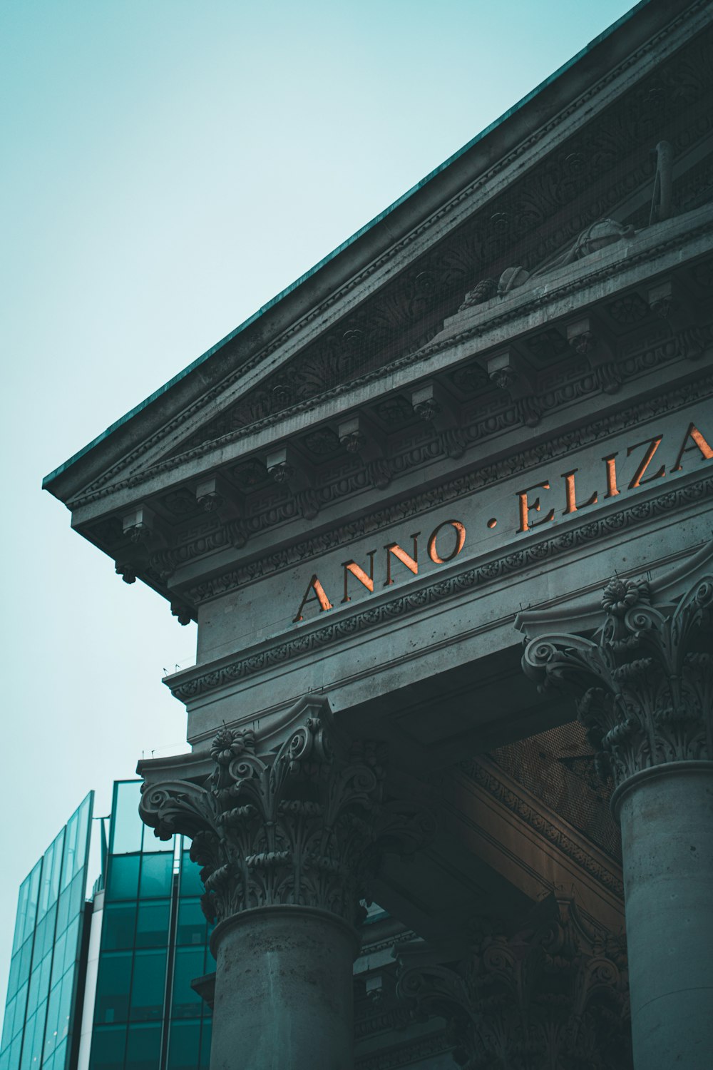 a tall building with a sign on the front of it