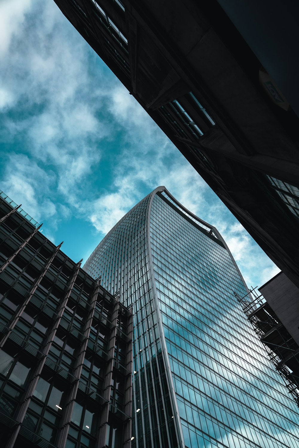 a very tall building with a sky in the background