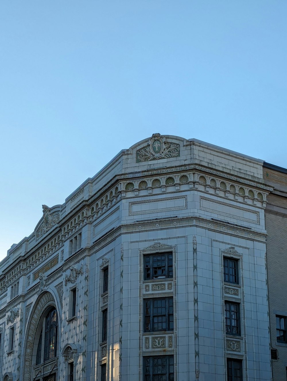 a large building with a clock on the top of it